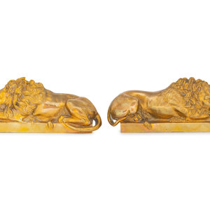 A Pair of Continental Bronze Recumbent