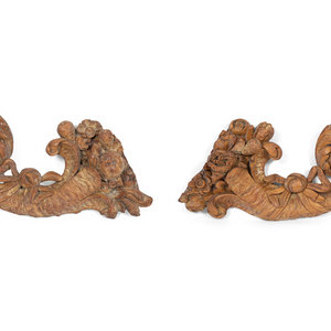 A Pair of Continental Carved Fruitwood