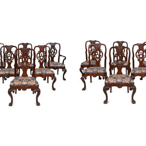 A Set of Twelve Continental Walnut