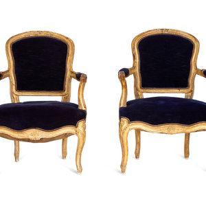 A Pair of Louis XV Giltwood Fauteuils