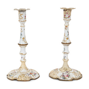 A Pair of Battersea Enameled Candlesticks
19th
