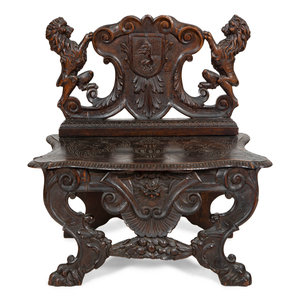 A Jacobean Style Carved Oak Bench