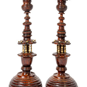 A Pair of Continental Wooden Candlesticks
