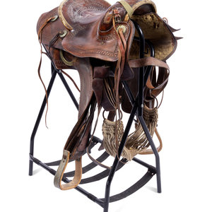 A Fred Mueller Tooled Leather Saddle
