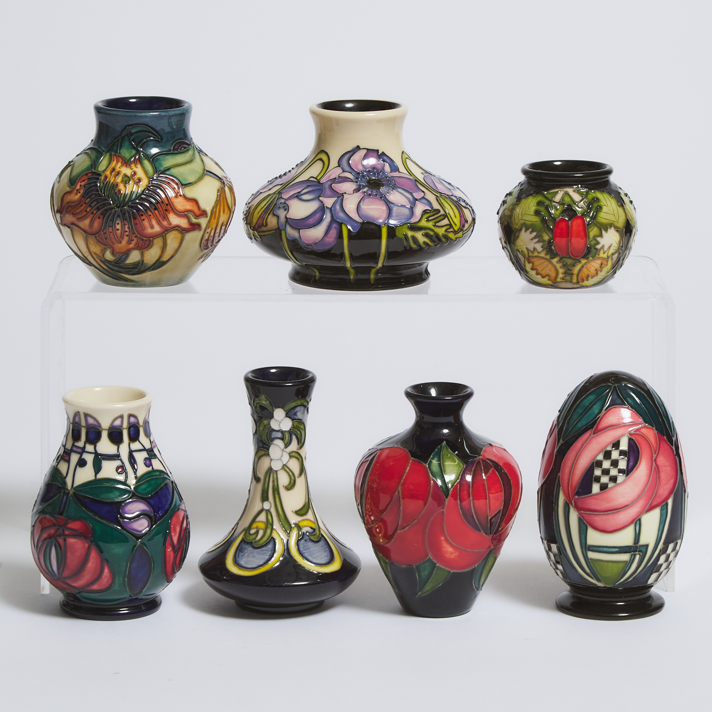 Six Moorcroft Small Vases and a