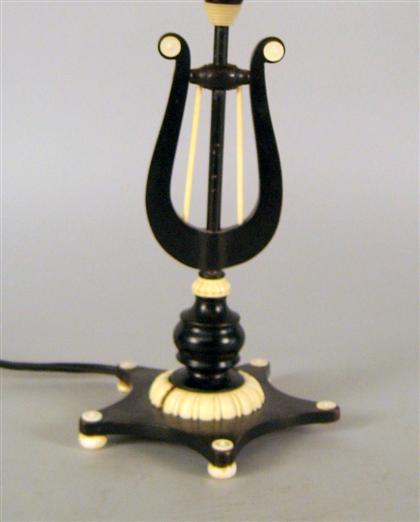 Continental ivory and ebonized lamp