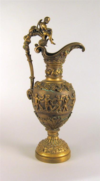 Gilt bronze ewer    With ornate