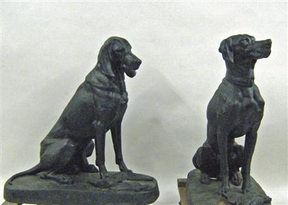 Two large cast iron dogs    Each modeled