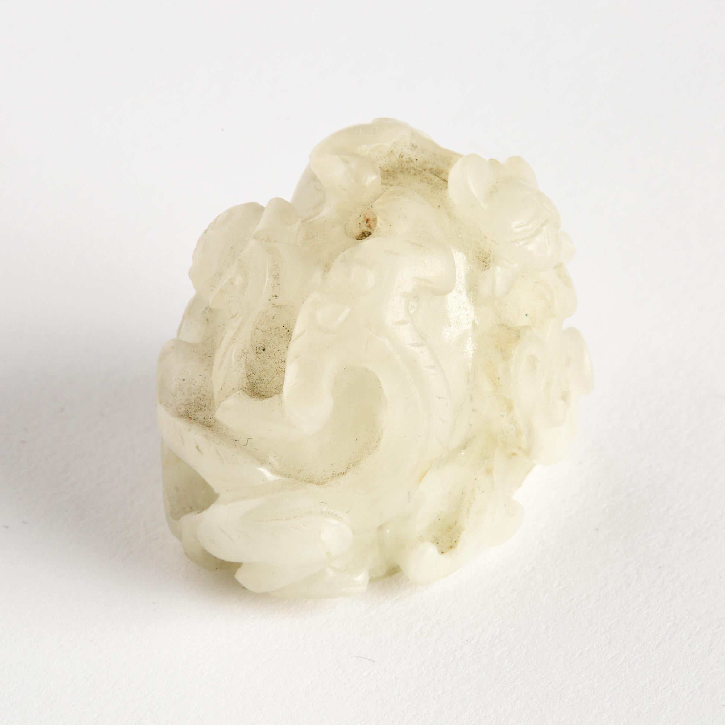 A White Jade Dragon Finial, Yuan Dynasty
