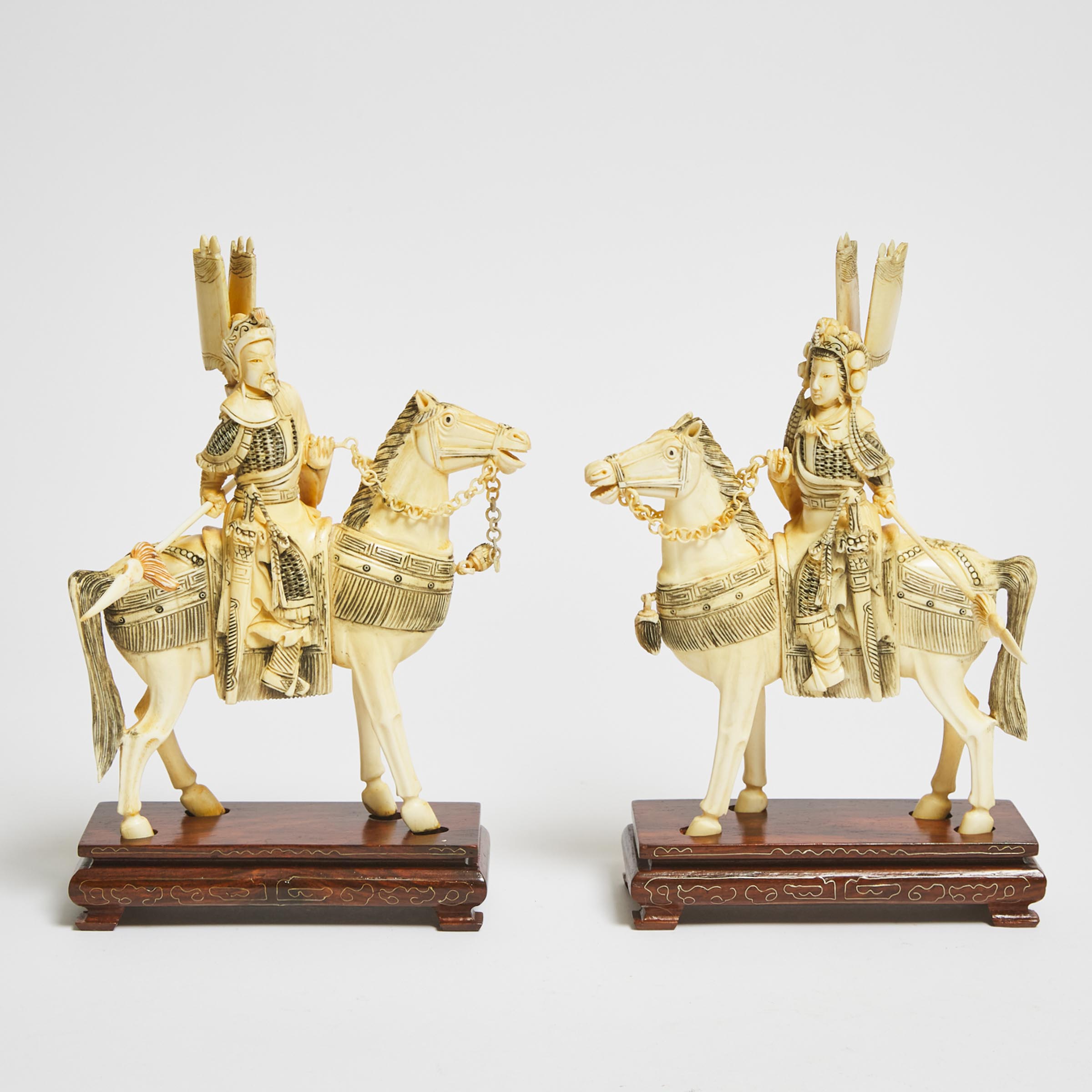 A Pair of Ivory Figures of King