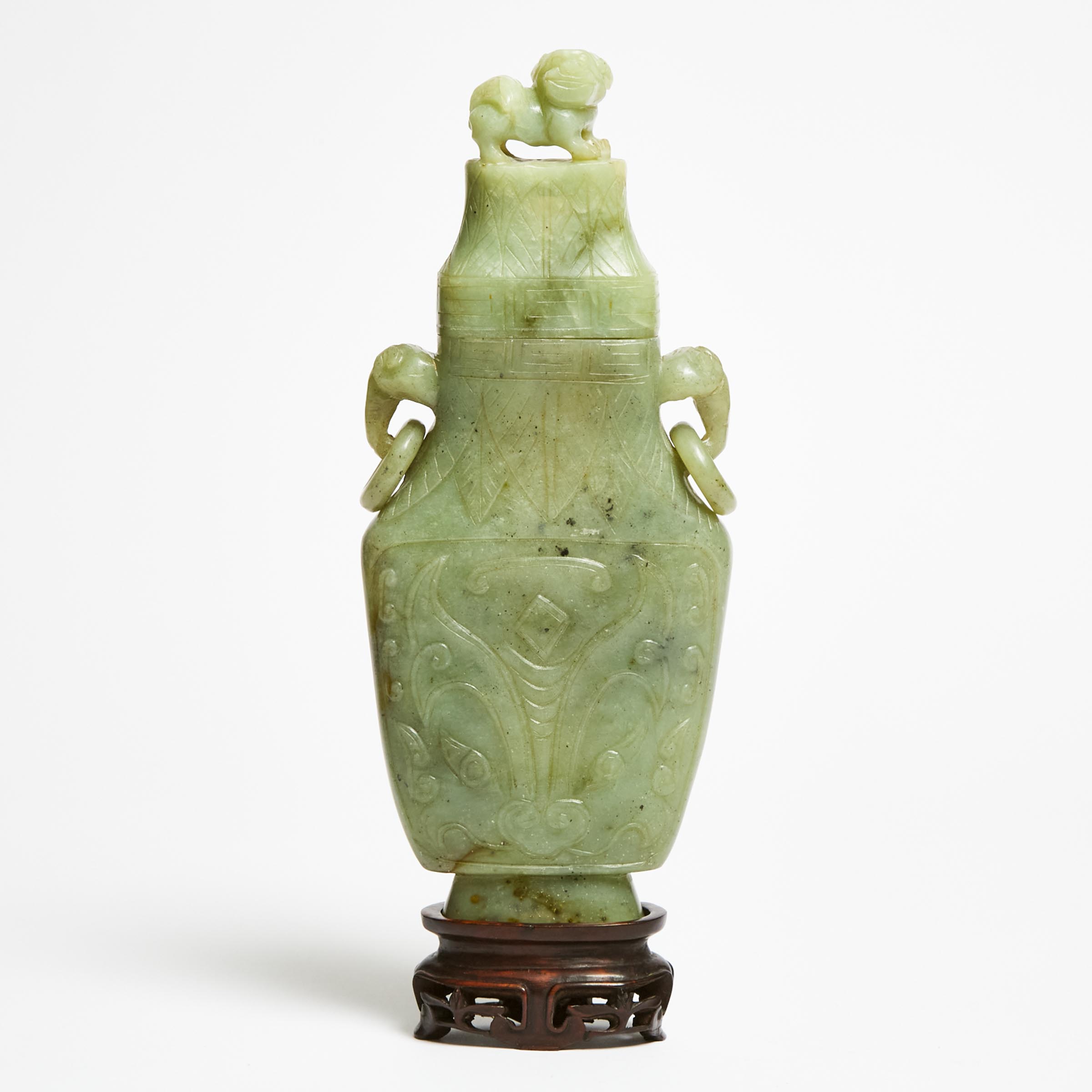 A Celadon Jade Vase and Cover With