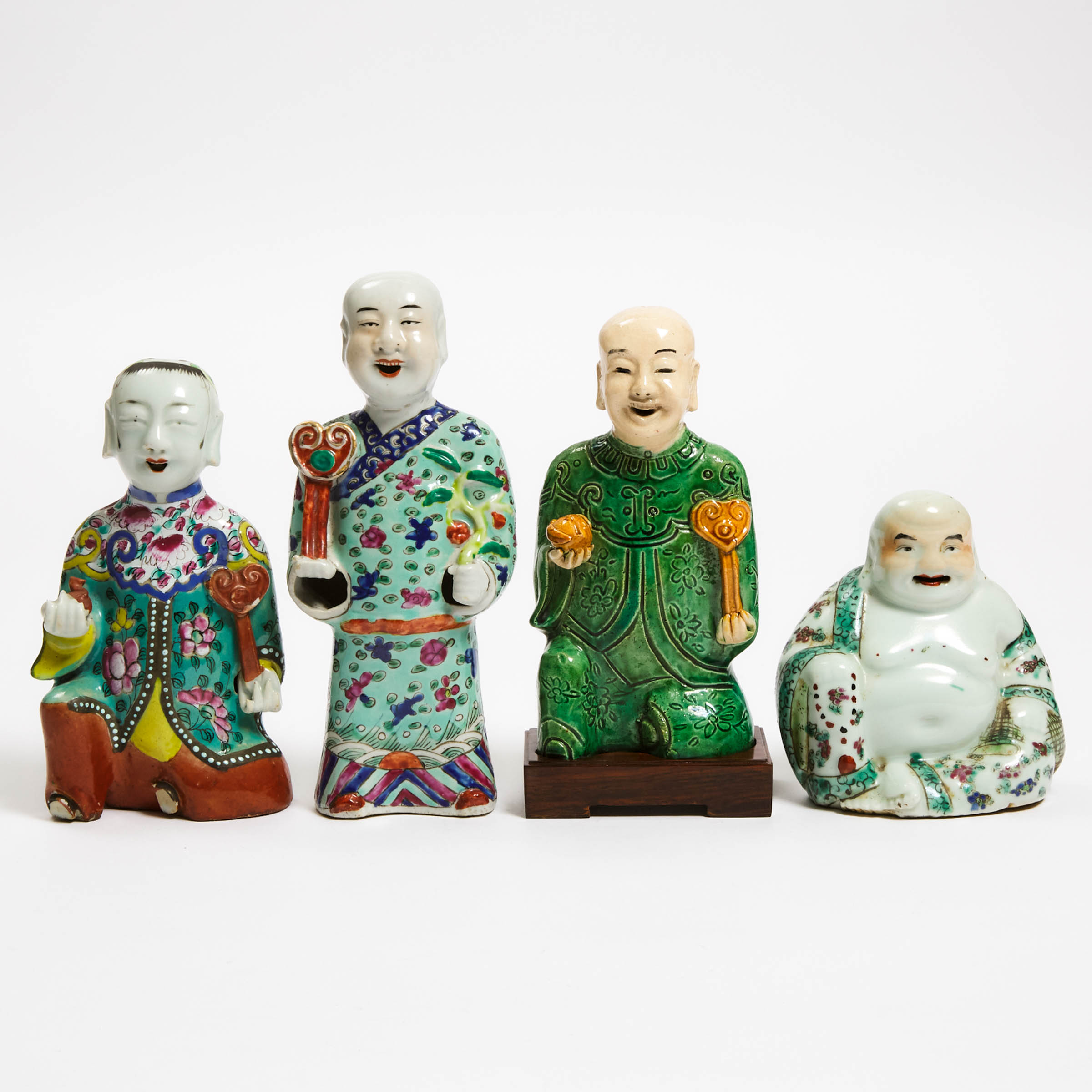 A Group of Four Famille Rose Figures,
