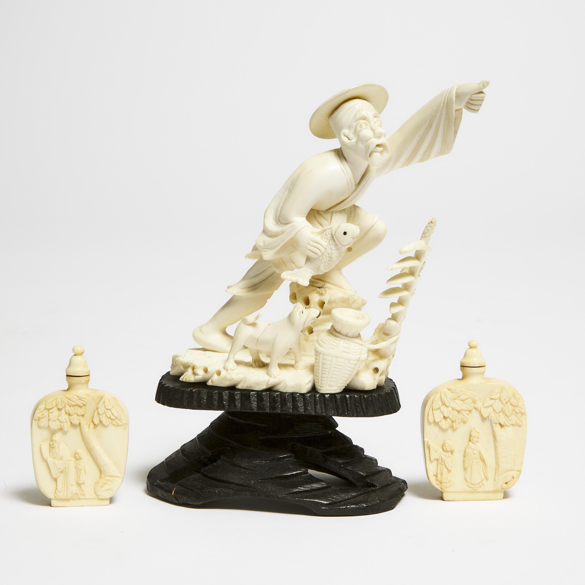 An Ivory Figure of a Fisherman,