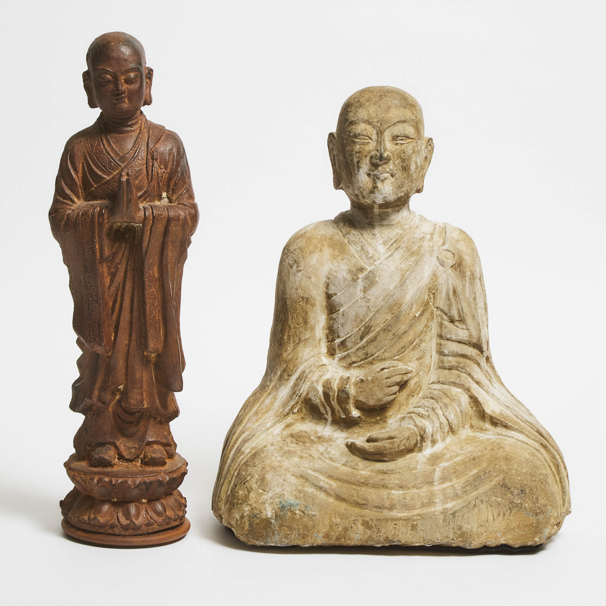 A Stone Figure of a Seated Monk, Together