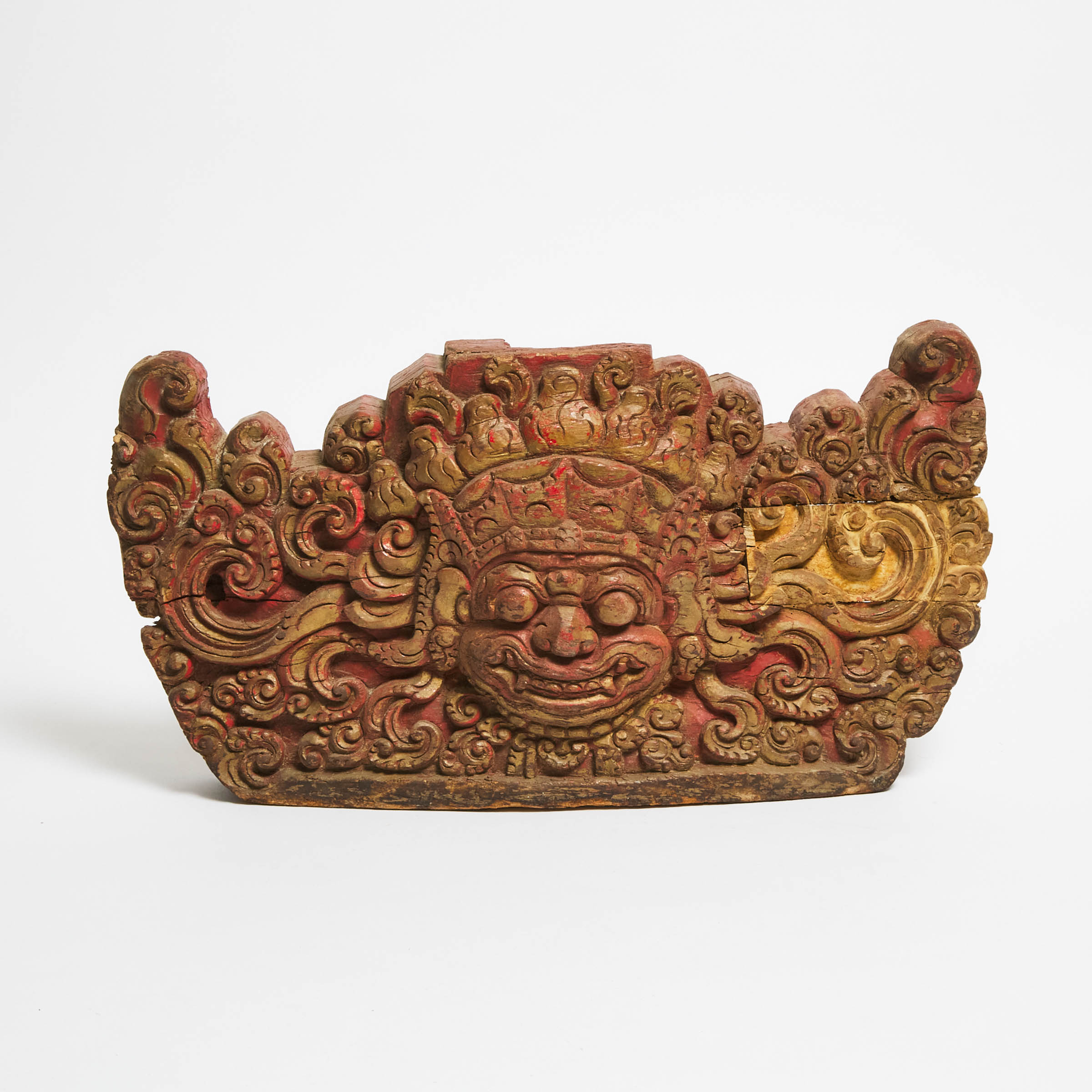 A Painted Wood Kirtimukha Mask,