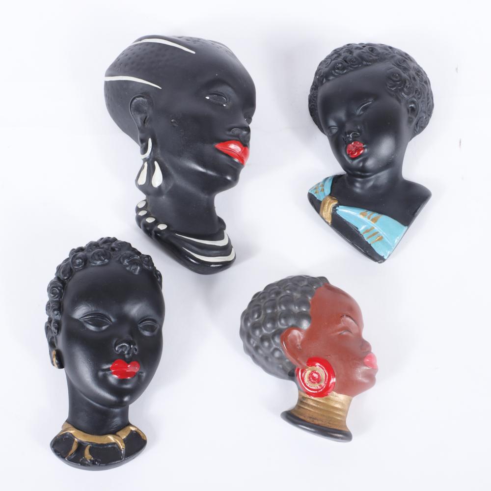 FOUR AFRICAN FEMALE CERAMIC AND