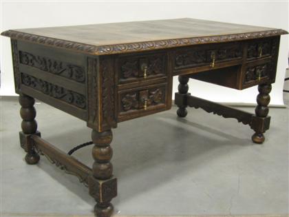 Renaissance style carved walnut desk