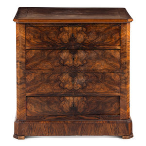 A Continental Figured Walnut Chest