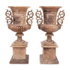 A Pair of Carved Alabaster Urns
Height