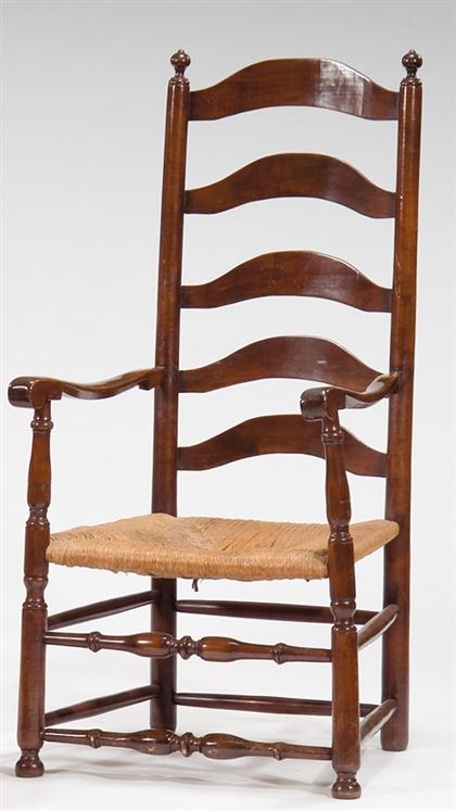 Stained rush seat ladder back armchair