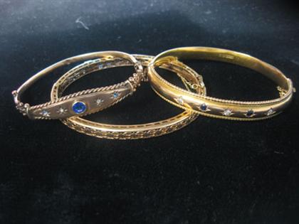 Group of three bangle bracelets 4bd53