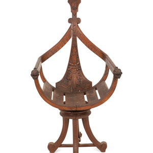 An Italian Carved Mahogany Gondola Chair