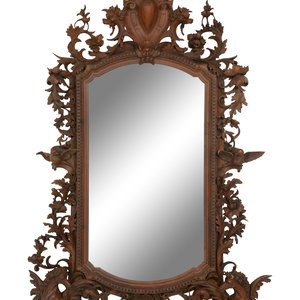 A Continental Foliate Carved Mirror
Probably