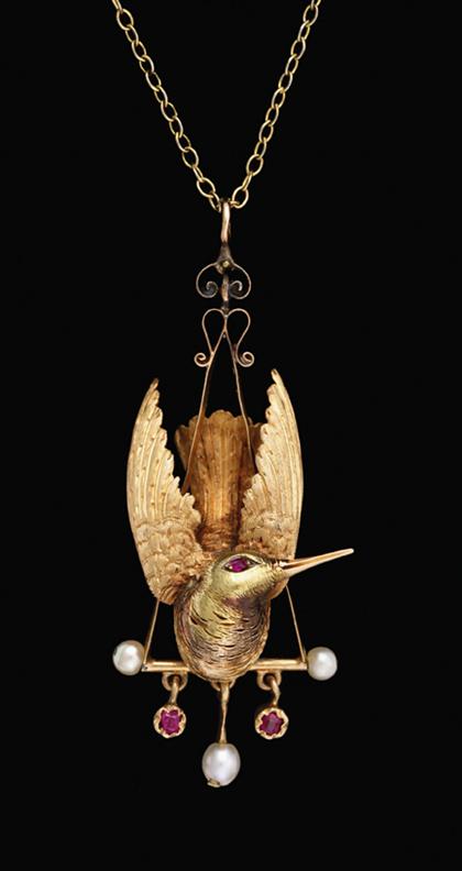 14 karat yellow gold "falling bird"