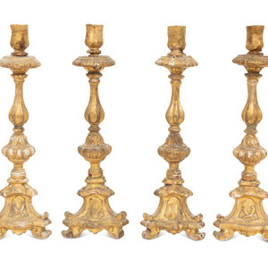 A Set of Four Italian Giltwood