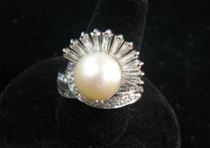 Platinum, diamond and pearl ring   