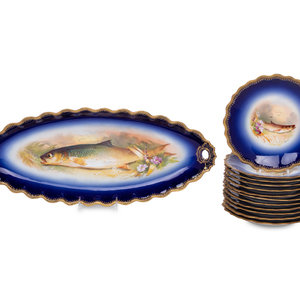 A Limoges Porcelain Fish Service
comprising