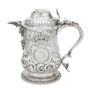 A George II Silver Covered Tankard
Thomas