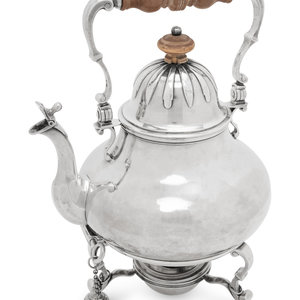 An English Silver Kettle on Lamp
