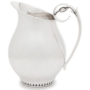 An Alphonse LaPaglia Silver Water Pitcher
International