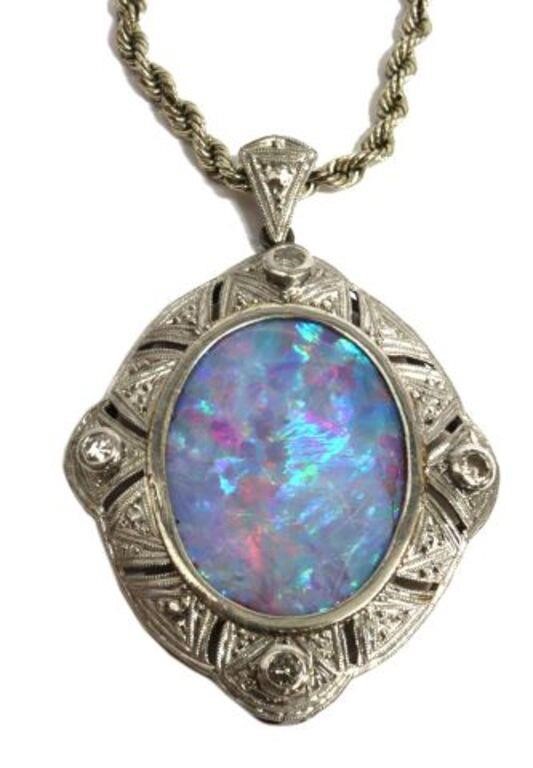 ESTATE 18K GOLD BLACK OPAL DOUBLET 2f6ca0