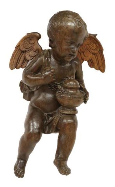 LARGE CONTINENTAL CARVED OAK PUTTO,