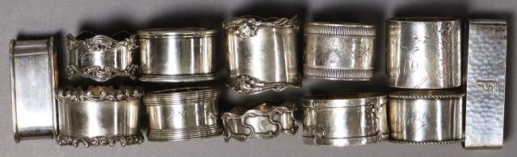 (12) GROUP OF STERLING SILVER NAPKIN
