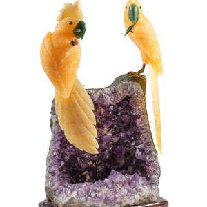 A Large Amethyst Geode with Carved