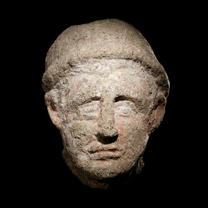 An Etruscan Over-Lifesized Nenfro Portrait