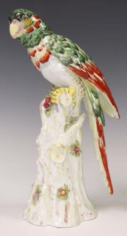 PORCELAIN FIGURE OF A GREEN & YELLOW