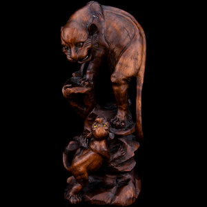 A Japanese Carved Wood Okimono
Late