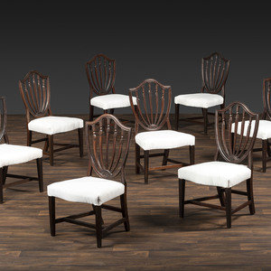 A Set of Eight Federal Carved Mahogany