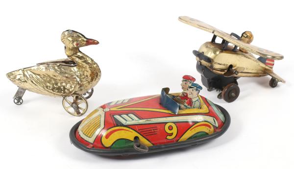 WIND-UP AND OTHER ANTIQUE TIN TOYS1.