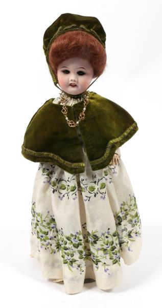 AN ANTIQUE FRENCH BISQUE HEAD DOLL
