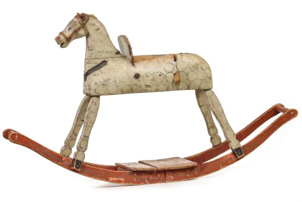 A 19TH CENTURY WOOD ROCKING HORSE,