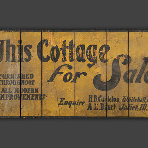 A Yellow Painted Wood 'This Cottage