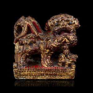 A Chinese Gilt and Red Painted 2f584a