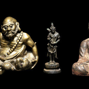 Three Asian Buddhist Figures
the