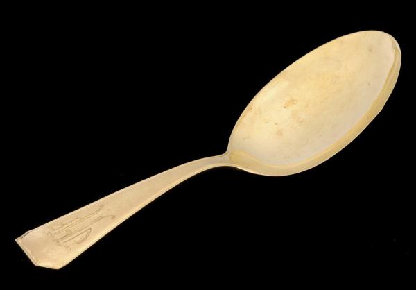 A SOLID 14K GOLD CHILDS FEEDING SPOON