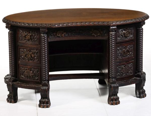 AN UNUSUAL AND HEAVILY CARVED OAK 2f5a71